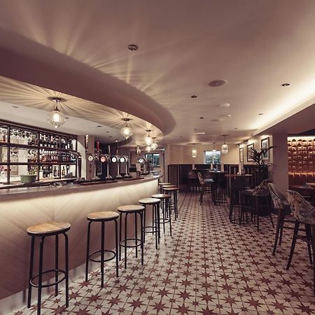 Longlands Inn & Cottages Карнфорт Екстериор снимка The bar at the 2018 edition of the London Design Festival