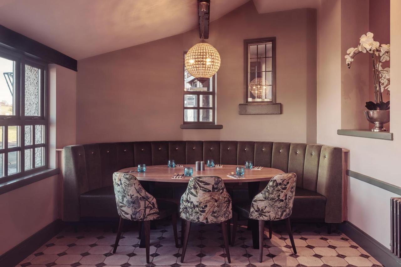 Longlands Inn & Cottages Карнфорт Екстериор снимка The restaurant's interior
