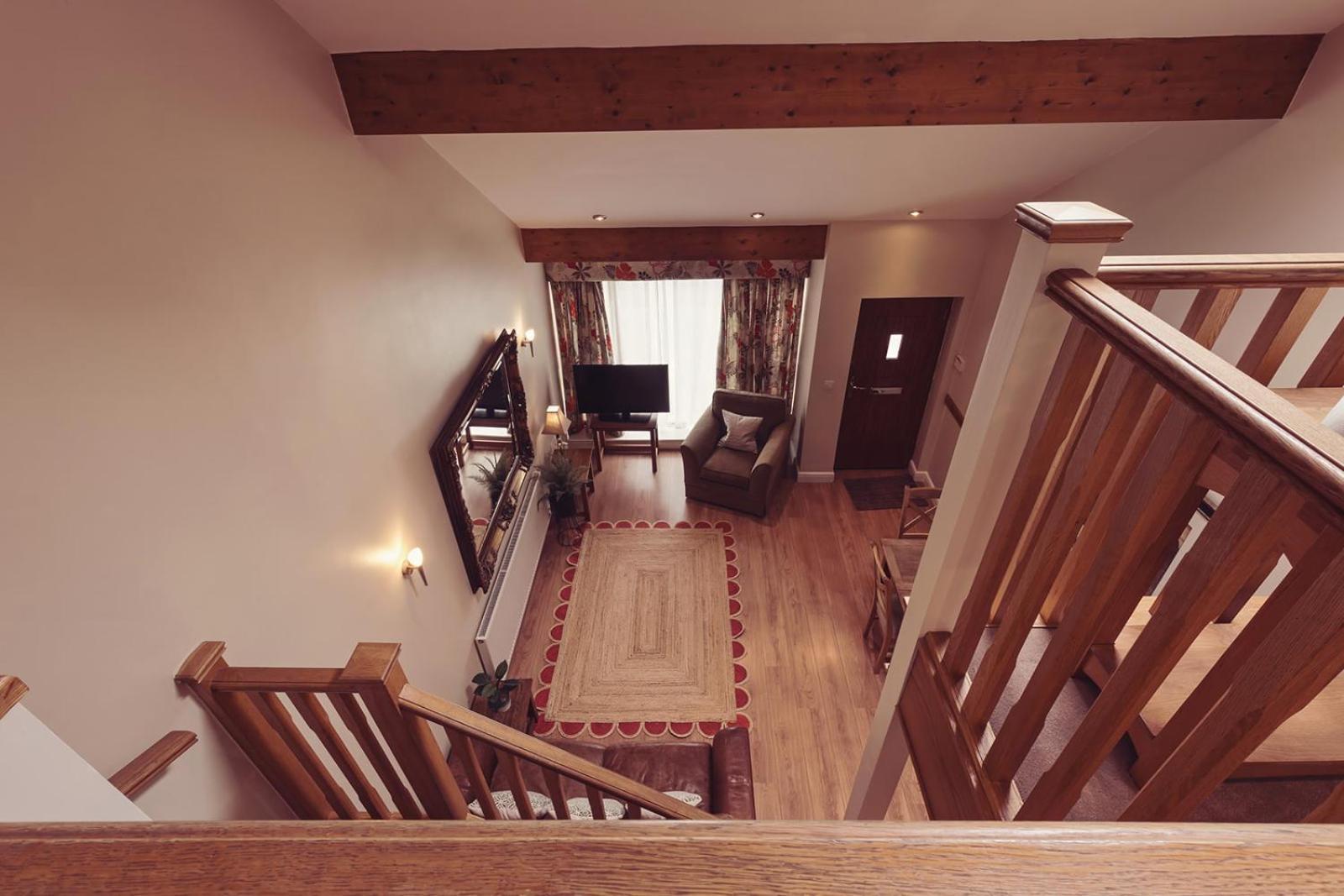 Longlands Inn & Cottages Карнфорт Екстериор снимка Interior of a chalet